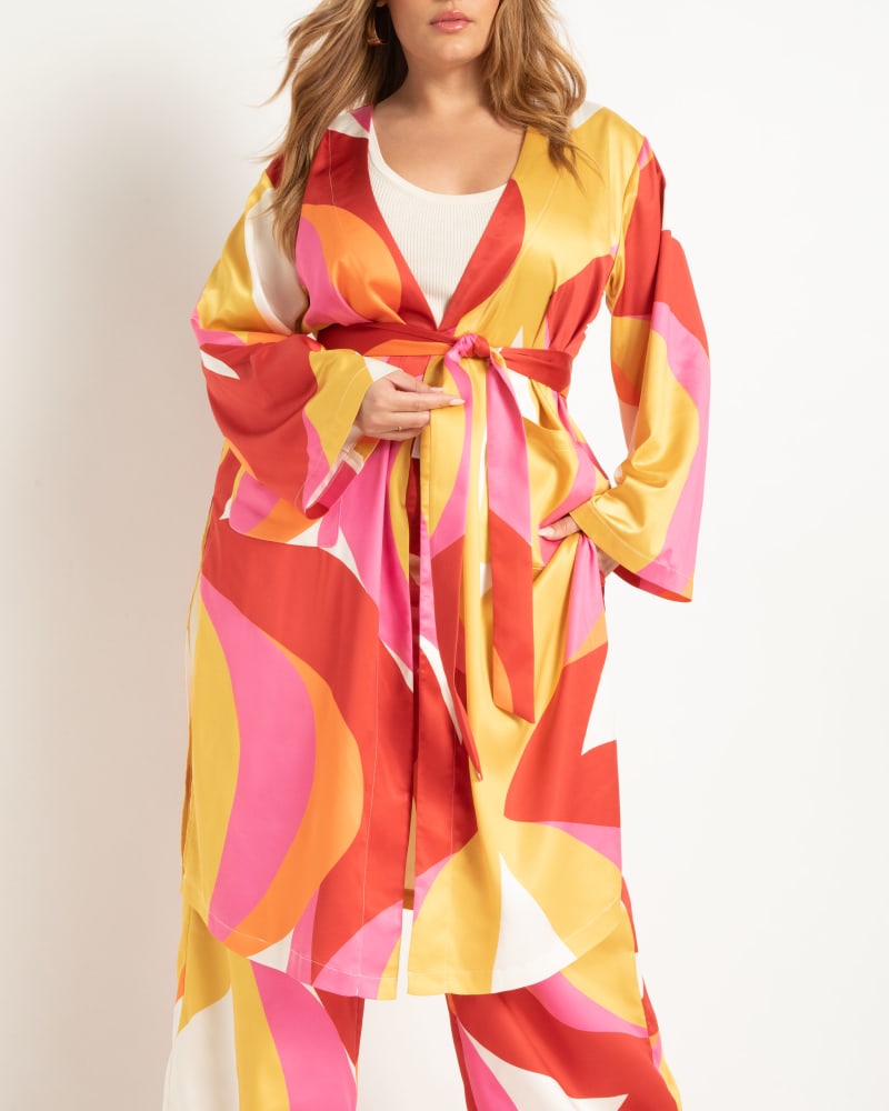 Front of a model wearing a size 24 Printed Wide Leg Pant in Graphic Swirl by ELOQUII. | dia_product_style_image_id:300041